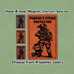 May include: An orange rectangular patch with the text "PUNCHE'S OTHER PROTECTOR" and an illustration of a soldier and a monkey. Three smaller patches are displayed, along with the text "Choose from 4 leather colors."