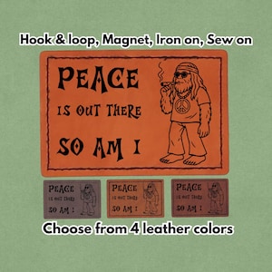 May include: Orange leather patch with the text "PEACE IS OUT THERE SO AM I" and a cartoon of a bigfoot smoking a pipe. Below are three smaller patches in different colors. The text "Choose from 4 leather colors" is at the bottom.