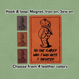 May include: Orange leather patch with a black frog illustration and the text "NO ONE CARED WHO I WAS UNTIL I INFLATED." Includes three smaller patches. Available as hook & loop, magnet, iron-on, or sew-on. Choose from 4 leather colours.