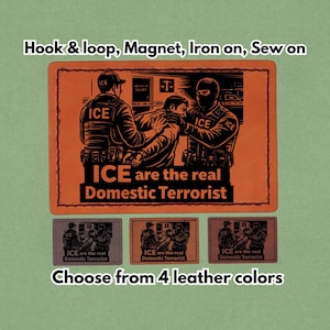 May include: Orange patch with black graphic of figures with the text "ICE are the real Domestic Terrorist." The patch is available in four leather colors and can be attached with hook and loop, magnet, iron-on, or sewn.
