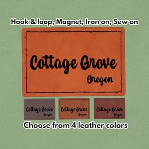 May include: An orange leather patch with the words "Cottage Grove Oregon" in black script. Below are three smaller patches in different colours. Text at the top says "Hook & loop, Magnet, Iron on, Sew on". The bottom text says "Choose from 4 leather colours".