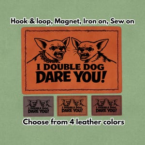 May include: Orange and black leather patches with the text "I DOUBLE DOG DARE YOU!" and a graphic of two snarling dogs. The image also shows the options: hook & loop, magnet, iron on, or sew on. Choose from 4 leather colors.