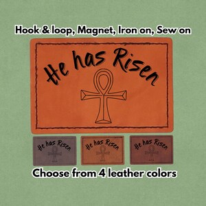 May include: An orange leather patch with the text "He has Risen" and an ankh symbol. Below are three smaller patches in different colors, also with the same text and symbol. The image includes the text "Choose from 4 leather colors."