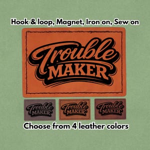 May include: An orange leather patch with the words "Trouble Maker" in a bold, black script. Below, three smaller patches in different colors are displayed. The text "Choose from 4 leather colors" is at the bottom. Options include hook & loop, magnet, iron-on, or sew-on.