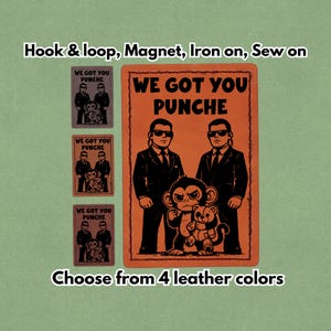 May include: Orange rectangular patch with the text "WE GOT YOU PUNCHE" and an illustration of two men in black suits and sunglasses with a monkey holding a teddy bear. Includes smaller patches and text: "Choose from 4 leather colors."