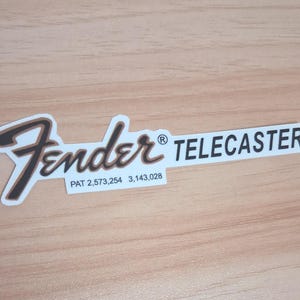 Calcomanía de transferencia al agua con logotipo estilo años 60, reproducción hecha a mano para Fender Telecaster, precortada y lista para usar.