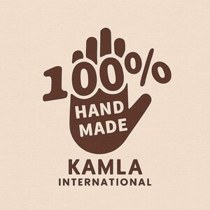 Kamla International logo on beige background featuring a brown hand and 100% HAND MADE text, branding for kilim rugs.