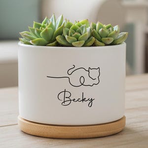 May include: A handmade wooden chopping board with a natural finish. The board has a live edge on one side and a smooth, rectangular shape. It is approximately 45 cm long and 30 cm wide.