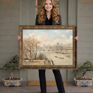 May include: An antique framed painting depicting a river scene with a bridge, boats, and figures. The artwork features a gold ornate frame and a muted color palette of blues, browns, and whites. The painting is held up in front of a person.