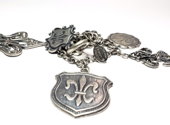 Fleur de lis charm best sale bracelet
