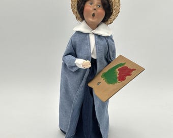 Byers Choice Caroler Profesora de arte Mujer pintora Artista 2000 Paleta de madera
