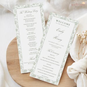 May include: Two wedding ceremony programs with a floral border and text. The programs include the wedding party details and ceremony schedule. The programs are on a wooden surface.