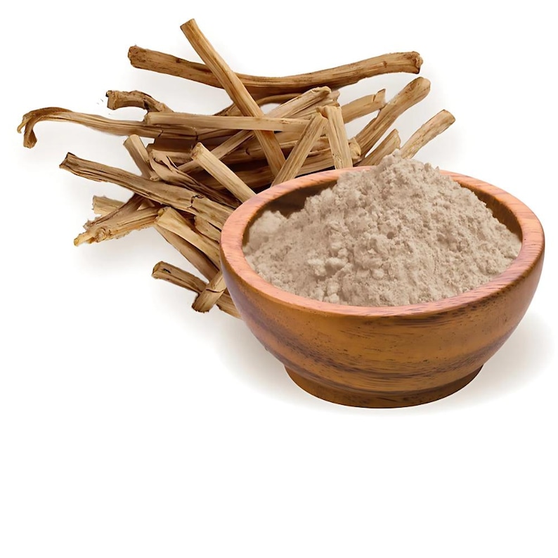 May include: A wooden bowl containing light brown powder is positioned beside a collection of tan-coloured sticks. The bowl is crafted from light-hued wood, and the powder has a fine, granular texture. The sticks are long, thin, and have a rough, natural appearance.