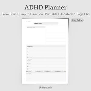 May include: A white ADHD planner with the text "ADHD Planner" and "From Brain Dump to Direction." The planner includes sections for "Brain Dump & Review," "Energy Boosts," and an "Action Board." The planner is A5 size.