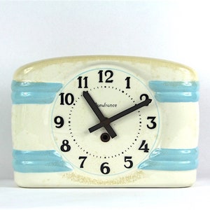 Vintage French Porcelain Ironstone Wall Clock with Shabby Chic Sky Blue and Tea Stained Coloring.