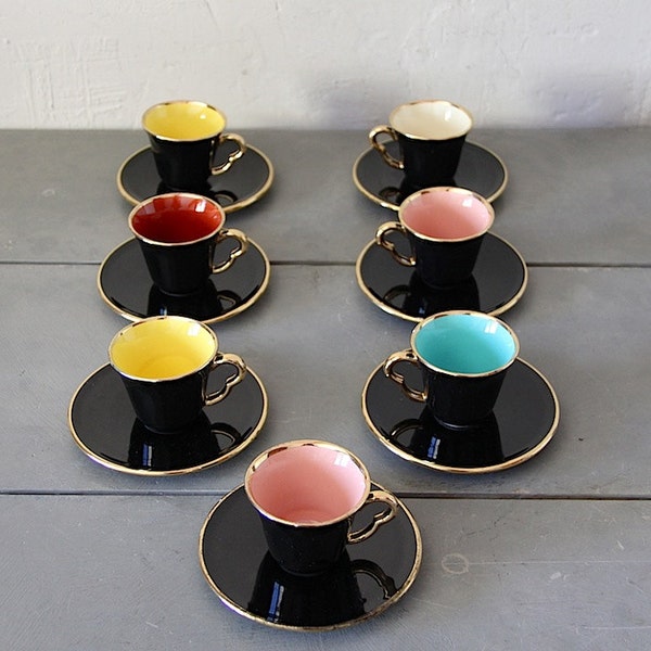 Beautiful French Set of Seven Cups and Saucers