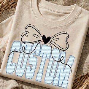 Custom Coquette Bow Mascot PNG Striped Varsity Lettering Game Day DTF Design