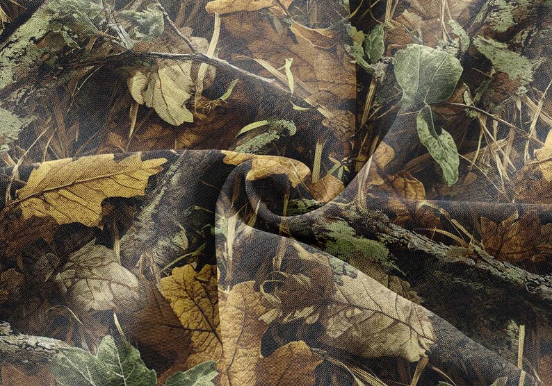 May include: Camouflage fabric featuring a detailed pattern of leaves in shades of brown, green, and yellow. The design mimics a forest floor with fallen leaves, branches, and foliage, creating a naturalistic camouflage effect.