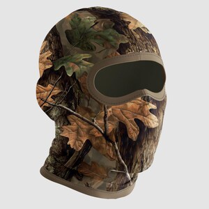 May include: A camouflage balaclava featuring a brown, green, and tan oak leaf design. The balaclava has a large eye opening and a tan trim. The fabric is printed with a realistic forest pattern, suitable for outdoor activities.