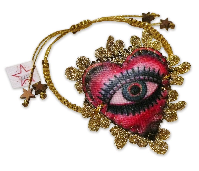 B612 sacred heart eye embroidered knotted bracelet image 1