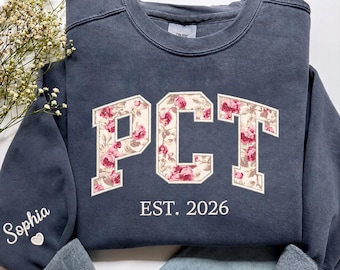 Sudadera personalizada con estampado floral para técnico de atención al paciente (PCT), cuello redondo con aplique de flores bordadas, regalo médico personalizado para personal de apoyo sanitario.