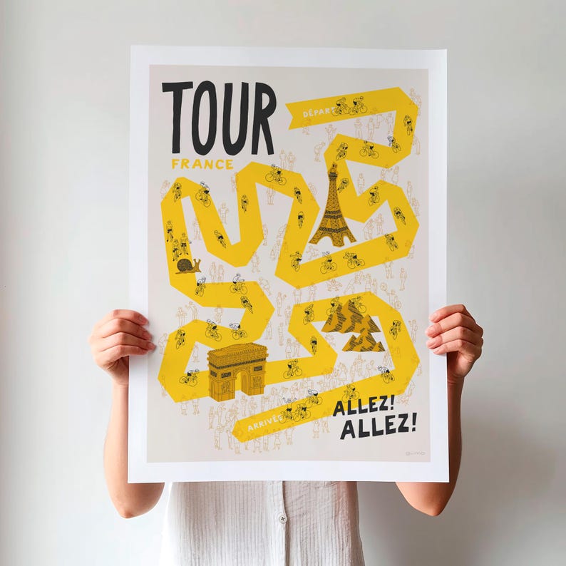 Unframed Tour cycling poster being held up, featuring a yellow winding race path on a neutral background, including fun illustrations of riders, fans and a selection of famous French landmarks.