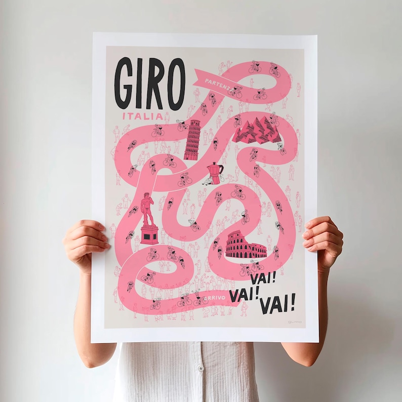 Unframed Giro Grand Tour cycling poster being held up, featuring a pink winding race path on a neutral background, including fun illustrations of riders, fans and a selection of famous Italian landmarks.