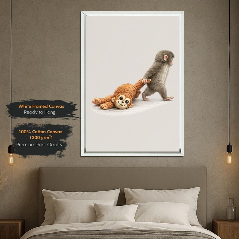 May include: A framed canvas print showing a gray monkey pulling a brown stuffed monkey. The print is on 100% cotton canvas and ready to hang. The text on the print reads "White Framed Canvas, Ready to Hang, 100% Cotton Canvas (300 g/m&sup2;), Premium Print Quality."