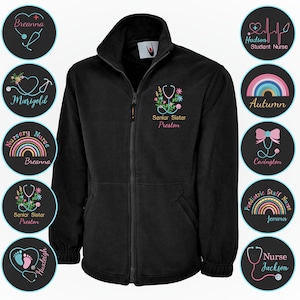 May include: Black fleece jacket with a full zip and a high collar. The jacket features embroidered designs of stethoscopes, flowers, and names. Several circular patches with medical-themed graphics and names are displayed around the jacket.