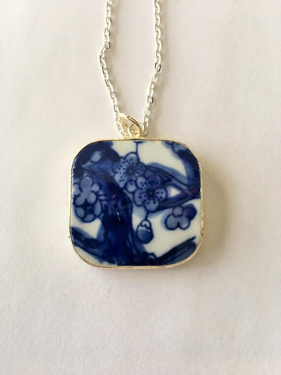 Asian porcelain shard framed charms photos