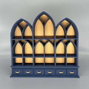 Dark Blue miniature bookcase set displayed empty on grey background.