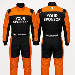 May include: Two racing suits, front and back views, in black and orange. The suits have the text "YOUR SPONSOR" and "YOUR NAME" printed on them. The suits have a collar and long sleeves. The back of the suit has an Irish flag.