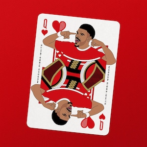 May include: Playing card featuring a cartoon illustration of a person in a red shirt, with the text "MORGAN GIBBS-WHITE" on the sides. The card is a Queen of Hearts, with the letter "Q" and heart symbols in the corners. The background is red.