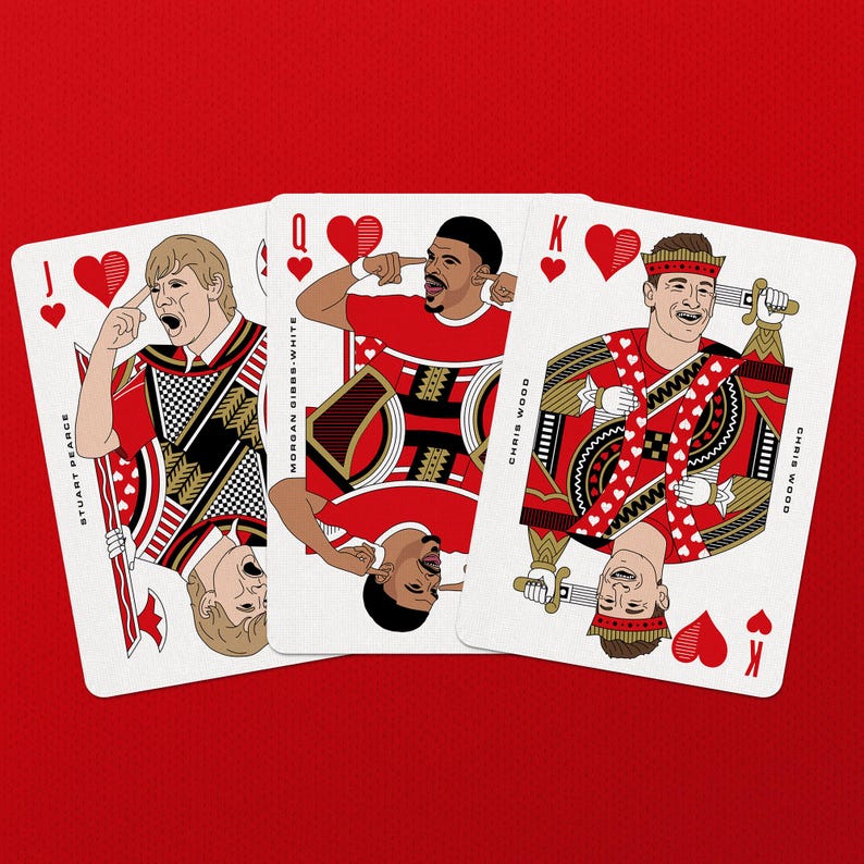 May include: Three playing cards featuring illustrations of people in red and white outfits. The cards are the Jack, Queen, and King of Hearts. The background is solid red.