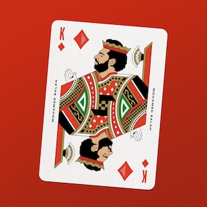 May include: Playing card depicting Mohamed Salah as the King of Diamonds. The card's design uses red, black, and gold. The name "MOHAMED SALAH" is printed on the sides. The background is a solid red colour.