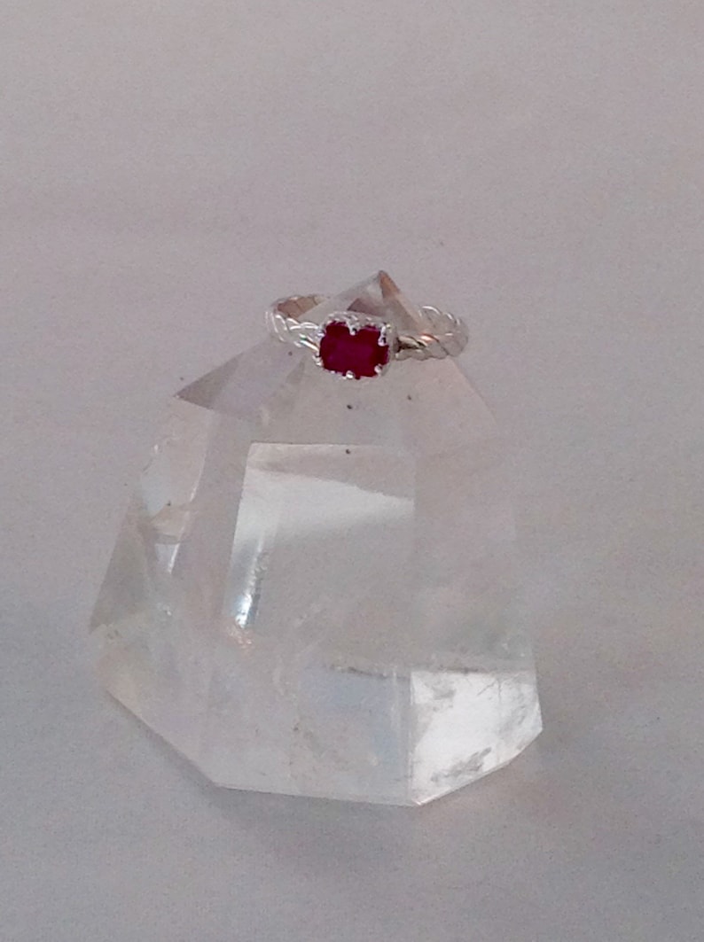 handmade ring with a fancy bezel and twisted domed band Genuine emerald cut ruby set in solid silver Ruby is Julys birthstone.