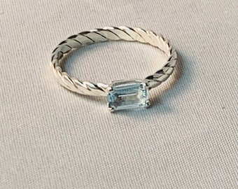 Genuine, emerald cut, aquamarine stacking ring in solid sterling silver. Aquamarine is the birthstone for March. Birthstone ring.