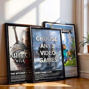 Może przedstawiać: Trzy prostokątne plakaty w ramkach oparte o ścianę. Lewy plakat przedstawia grafikę z gry The Witcher 3: Wild Hunt. Środkowy plakat zawiera tekst CHOOSE ANY 3 VIDEO GAMES z przykładowym opisem. Prawy plakat przedstawia grafikę z gry Minecraft.