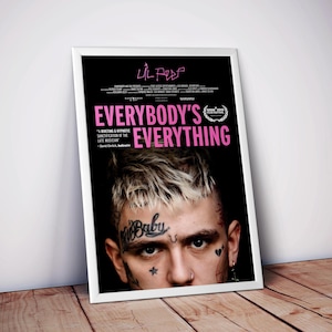 May include: A framed poster for the film "Everybody's Everything" featuring the late musician Lil Peep. The poster has a black background with pink text and a close-up of Lil Peep's face, showcasing his tattoos and hairstyle.