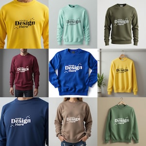 May include: A collection of crewneck sweatshirts in various colors, including yellow, teal, olive green, burgundy, blue, and tan. Each sweatshirt features the text "YOUR Design Here" in white. Some are displayed on hangers, while others are modeled.