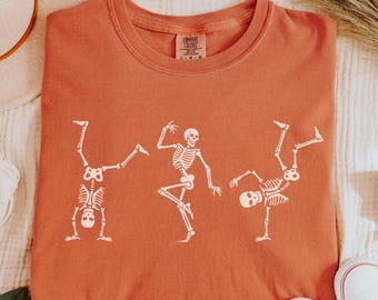 Camiseta de Halloween con esqueleto satírico político ligeramente sutil, camiseta de temporada espeluznante con esqueletos bailando, top con disfraz satírico divertido