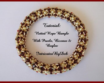 May include: A gold and brown beaded bracelet with pearls, bicones, and bugles. The bracelet is in the shape of a rope and has a netted design. The text "Tutorial: Netted Rope Bangle With Pearls, Bicones & Bugles Intricates By Deb" is written on a white background.