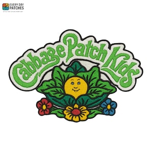 May include: Embroidered patch featuring the text "Cabbage Patch Kids" in green, with a smiling yellow face surrounded by green leaves and colorful flowers. The patch has a white border and is designed to be ironed on.