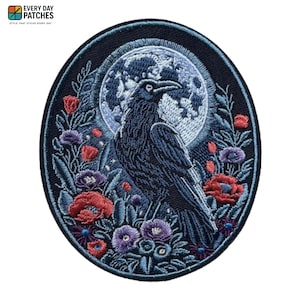 May include: Embroidered patch with a raven design, set against a full moon and floral elements. The patch features a dark colour palette with red, purple, and blue flowers. The text "EVERY DAY PATCHES" is at the top.