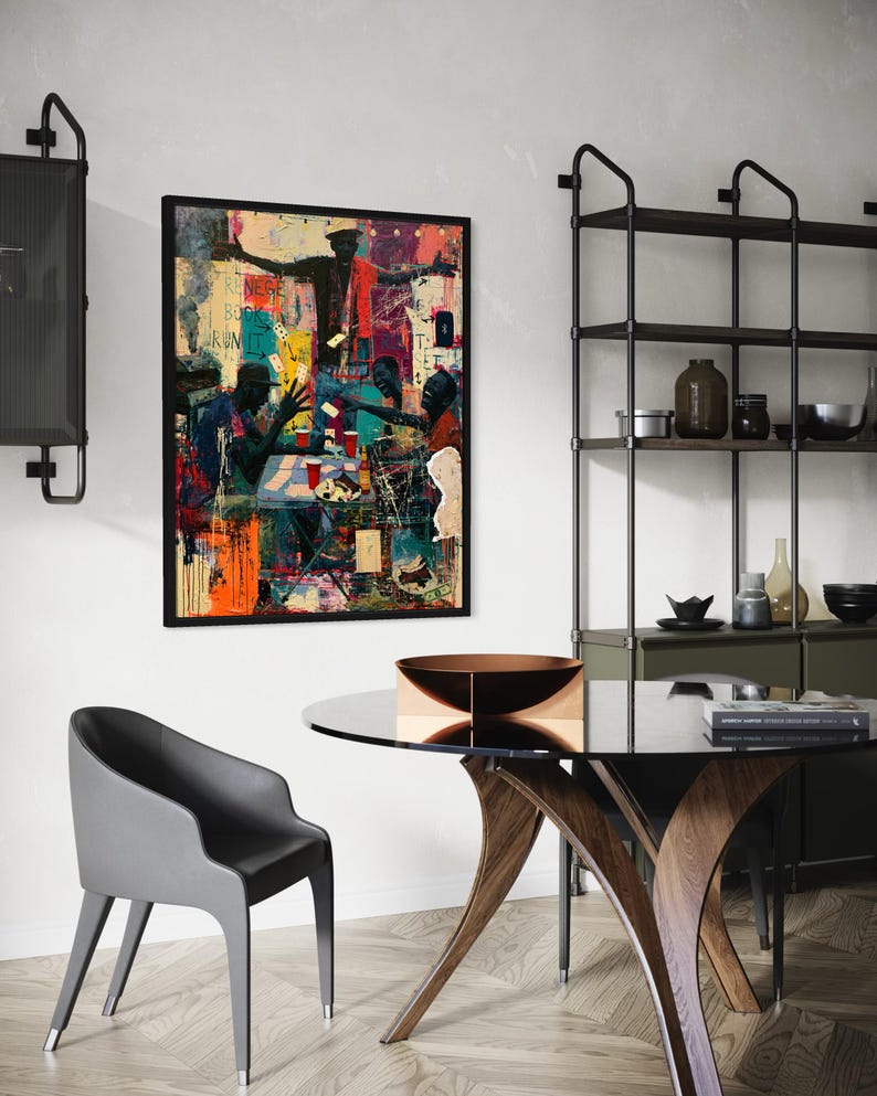 May include: A rectangular framed wall art print featuring a vibrant, multi-colored abstract scene of figures gathered around a table playing cards. The artwork incorporates layered paint splatters, bold orange and red tones, and text reading RENEGE BOOK IT RUN IT.