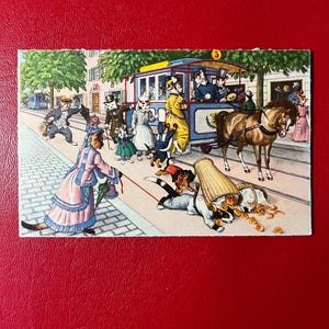 May include: Vintage postcard featuring anthropomorphic animals in a city scene. A horse-drawn tram is in the center, with dogs and cats dressed in human clothing. The scene includes a woman in a pink dress and a man in a suit.