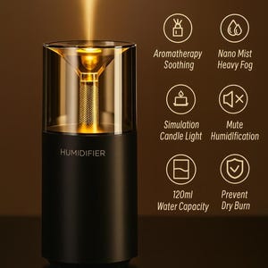 Op de afbeelding: Zwarte luchtbevochtiger met een cilindrisch ontwerp en een transparant bovendeel. De bovenkant straalt een warm, goudkleurig licht uit. Kenmerken zijn aromatherapie, nano-mist en een capaciteit van 120 ml. De tekst "HUMIDIFIER" is zichtbaar.