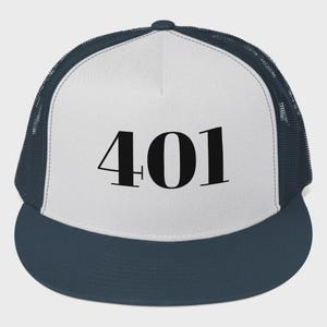 May include: A trucker hat with a white front panel and a navy blue brim and mesh back. The number "401" is printed in bold black font on the front panel.