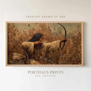 May include: A framed print of a painting depicting a person aiming a bow and arrow in a field of tall, golden grass. The artwork is in a wooden frame. The text "INSTANT FRAME TV ART" is at the top, and "PORTHAUS PRINTS art society" is at the bottom.