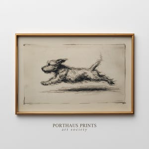 May include: A framed black and white etching of a running dog. The dog is depicted in mid-stride, with its legs extended and tail up. The artwork is set against a neutral background and framed in a gold-colored frame. The text "PORTHAUS PRINTS art society" is at the bottom.